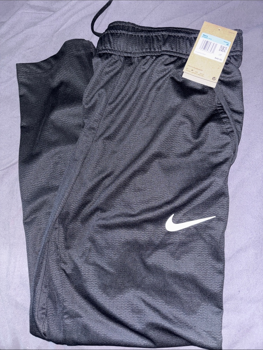 Nike mens medium black dry fit pants.